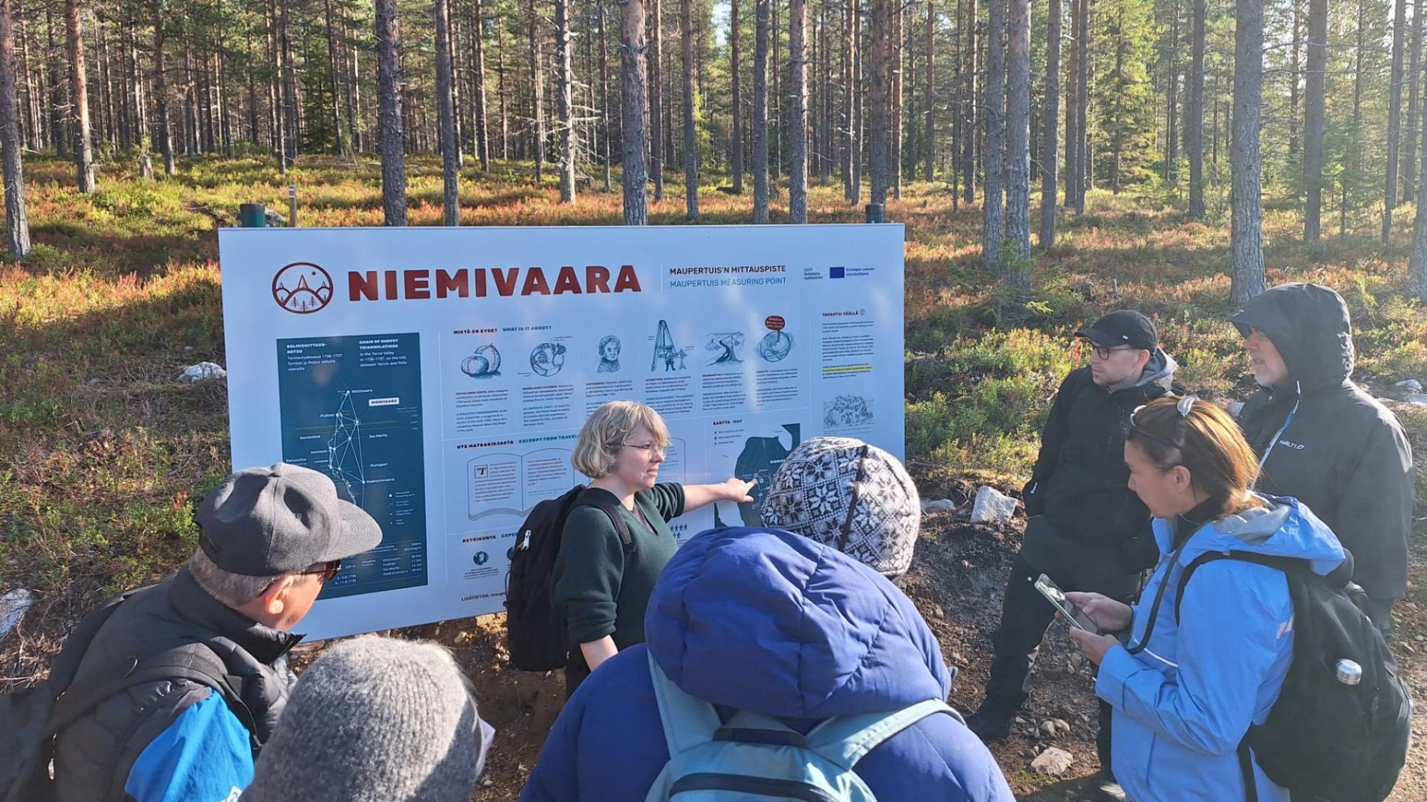 Participants visiting a site connected with the history and cultural landscape of the Tornio Valley.